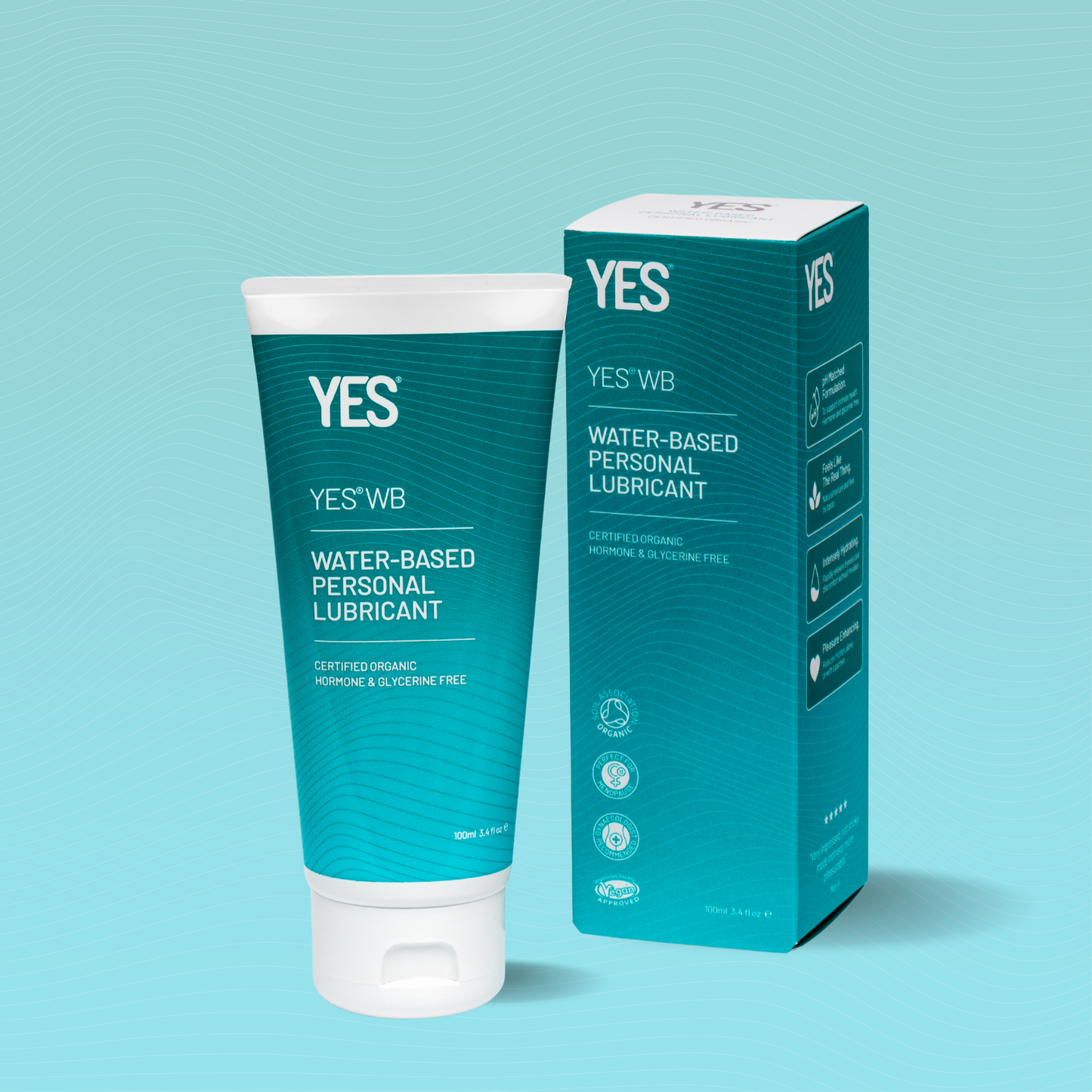 YES WB water based lubricant 100ml. Tube and carton on a blue background.